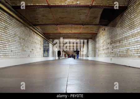 A view down the underground walkway that links South Kensington underground station with the museums on Exhibition Road, in London. Stock Photo