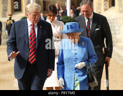 Queen Elizabeth II, US President Donald Trump, first lady Melania Trump and Lieutenant Colonel Sir Andrew Ford walk in the Quadrangle during a ceremonial welcome at Windsor Castle, Windsor. Stock Photo