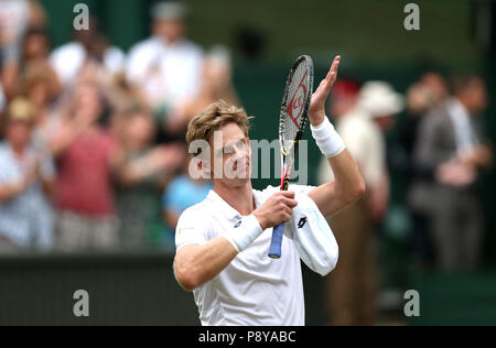 South African eighth seed Kevin Anderson celebrates having reached his first Wimbledon final, beating American ninth seed John Isner 7-6 (8/6) 6-7 (5/7) 6-7 (9/11) 6-4 26-24 in the longest semi-final in the tournament's history on day eleven of the Wimbledon Championships at the All England Lawn tennis and Croquet Club, Wimbledon. Stock Photo