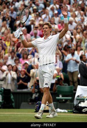 South African eighth seed Kevin Anderson celebrates having reached his first Wimbledon final, beating American ninth seed John Isner 7-6 (8/6) 6-7 (5/7) 6-7 (9/11) 6-4 26-24 in the longest semi-final in the tournament’s history on day eleven of the Wimbledon Championships at the All England Lawn Tennis and Croquet Club, Wimbledon. Stock Photo