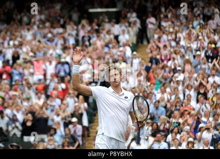 South African eighth seed Kevin Anderson celebrates having reached his first Wimbledon final, beating American ninth seed John Isner 7-6 (8/6) 6-7 (5/7) 6-7 (9/11) 6-4 26-24 in the longest semi-final in the tournament's history on day eleven of the Wimbledon Championships at the All England Lawn Tennis and Croquet Club, Wimbledon. Stock Photo