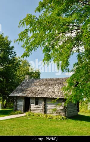 Log cabin replica at the site of Laura Ingalls Wilder's birthplace, setting for book 'Little House in the Big Woods', Pepin, Wisconsin, USA Stock Photo