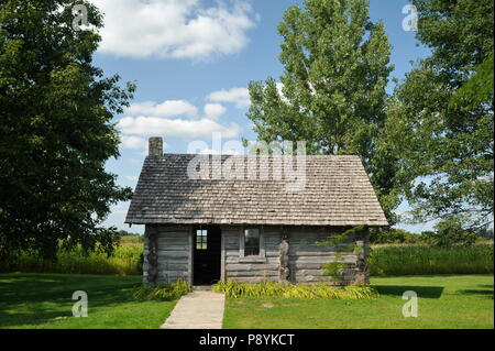 Log cabin replica at the site of Laura Ingalls Wilder's birthplace, setting for book 'Little House in the Big Woods', Pepin, Wisconsin, USA Stock Photo