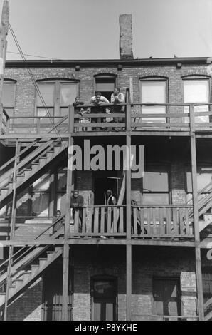 Rear View of Apartment House with Wood Staircase, South Side, Chicago, Illinois, USA, Russell Lee, Farm Security Administration, April 1941 Stock Photo