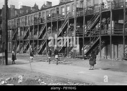 Rear View of Apartment Houses with Wood Staircase, South Side, Chicago, Illinois, USA, Russell Lee, Farm Security Administration, April 1941 Stock Photo