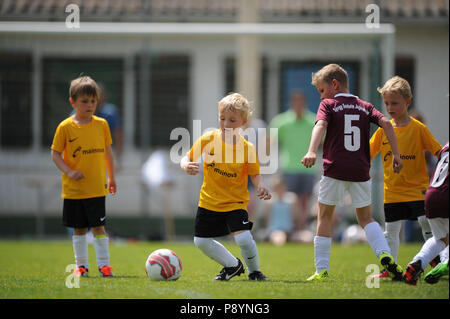 Kids children playing soccer in jersey Stock Photo