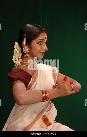 mohiniyattam is one of the eight classical dance forms of india,from the state of kerala.it is distinct for the graceful body movements Stock Photo