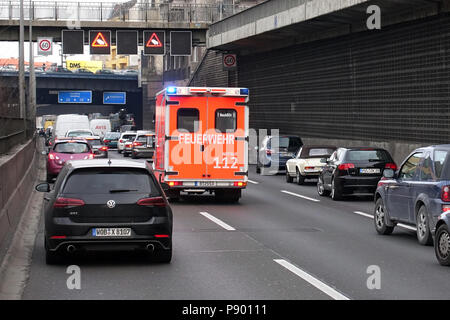 Berlin, Germany, cars are on the A100 a rescue lane for an ambulance of the Berlin Fire Department Stock Photo