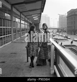 Berlin, GDR, young women wear the latest autumn fashion in the city Stock Photo