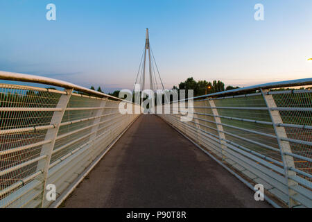 White Cable Stayed footbridge across the M60 at Sale Water Park, Greater Manchester, England, Uk. Stock Photo