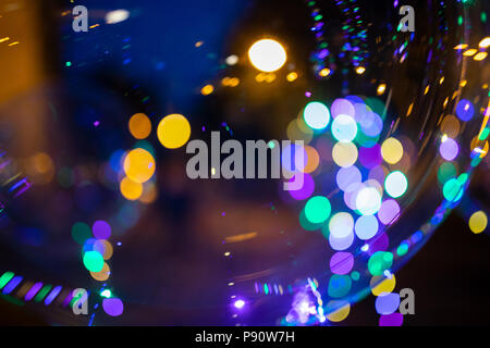 Vivid lights at night. Illuminated balloons with helium on the streets of Gniezno, Poland Stock Photo