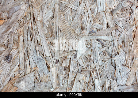 Textured wooden chipboard and plywood. Close up background backdrop view. Stock Photo