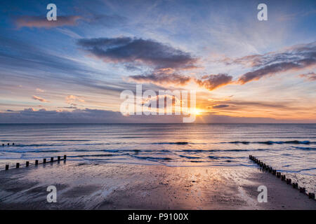 Sunrise at Bridlington Beach, East Riding of Yorkshire. Stock Photo