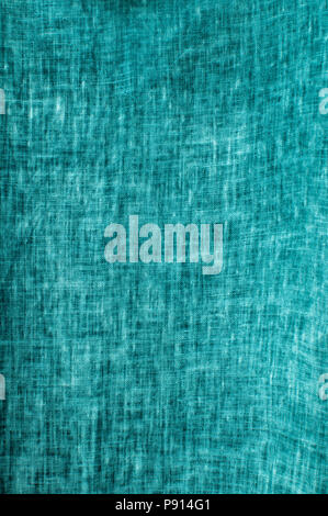 Texture of turquoise natural linen flax fabric closeup as textile background Stock Photo