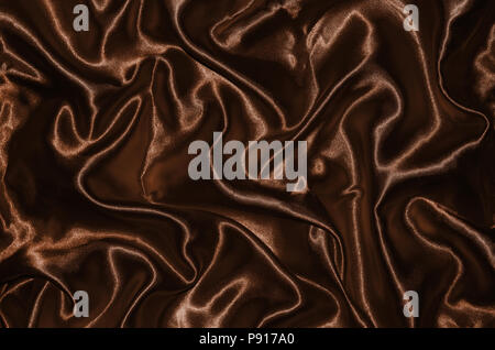 Abstract Background by brown fabric, Wallpaper and texture by Textile brown, Top view and wave of stripe fabric. Stock Photo