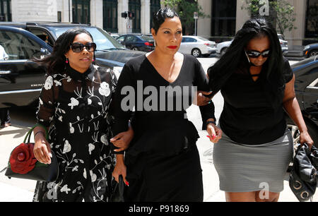 Detroit, MICHIGAN, USA. 13th July, 2018. MONICA MORGAN-HOLIEFIELD, 55, of Harrison Township, enters the Federal Courthouse in Detroit, Michigan on Friday, July 13, 2018. The widow of United Auto Workers Vice President General Holiefield was sentenced to 18 months in federal prison for a tax crime in a as part of a federal investigation of the auto industry and the United Auto Workers. Credit: Jeff Kowalsky/ZUMA Wire/ZUMAPRESS.com/Alamy Live News Stock Photo