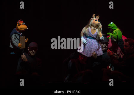 The O2 Arena, UK. 13th July 2018,Miss Piggy and Kermit the Frog with scooter At The Muppets Take The O2, Peninsula Square, London. © Jason Richardson / Alamy Live News Stock Photo