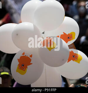 London, UK, July 14th 2018: Balloons with Donald Trump as a baby in Central London during the protest against President Trump's visit to the UK Credit: Ink Drop/Alamy Live News Stock Photo