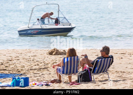 Bournemouth, Dorset, UK. 14th July 2018. UK weather: The heatwave continues with another hot sunny day, as sunseekers make the most of the glorious weather and head to the seaside at Bournemouth beaches. Credit: Carolyn Jenkins/Alamy Live News Stock Photo