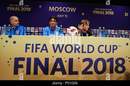 Moscow, Russia. 14th July, 2018. Soccer, World Cup, the national team of Crotia before the final match between France vs Croatia: Croatia's coaches Zlatko Dalic (C), Luka Modric (R), and Croatia's press spokesperson Tomislav Pacak attending a press conference. Credit: Christian Charisius/dpa/Alamy Live News Stock Photo