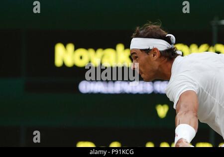 London, UK, July 14, 2018 (XINHUA) -- Rafael Nadal of Spain reacts during the men's singles semifinal match against Novak Djokovic of Serbia at the Wimbledon Championships 2018 in London, Britain, on July 13, 2018. Djokovic won 3-2. (Xinhua/Guo Qiuda) Stock Photo