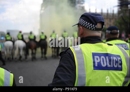Westminster, London, UK. 14th July, 2018. Anti fascist  groups march against the Free Tommy Robinson march held in Whitehall. Credit: Richard Hancox/Alamy Live News Stock Photo