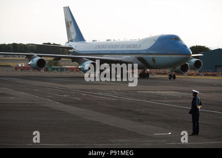 Prestwick, Scotland, on 13 July 2018. President Donald Trump, and wife Melania, arrive on Air Force One at Glasgow Prestwick International Airport at the start of a two day trip to Scotland. Image Credit: Jeremy Sutton-Hibbert/ Alamy News.
