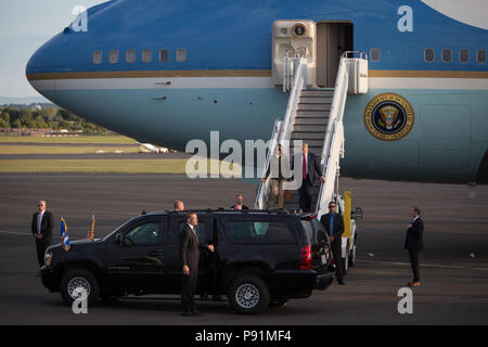 Prestwick, Scotland, on 13 July 2018. President Donald Trump, and wife Melania, arrive on Air Force One at Glasgow Prestwick International Airport at the start of a two day trip to Scotland. Image Credit: Jeremy Sutton-Hibbert/ Alamy News. Stock Photo