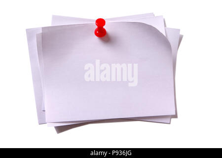 Several plain white sticky post notes with red pushpin Stock Photo