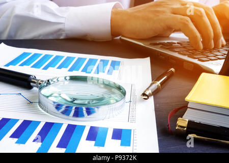 Accountant is working in the office. Audit or accounting. Stock Photo