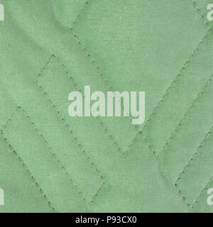quilted fabric texture with geometric pattern Stock Photo