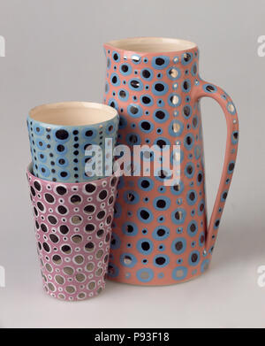 Close-up of patterned ceramic mugs and jug Stock Photo