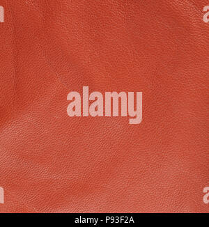 Orange leather texture. Square, close up Stock Photo