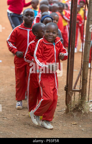 Nairobi, Kenya - Students in sportswear tracksuits at St. John's Community Center Pumwani. Stock Photo