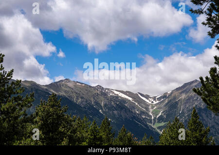 Mountain ridge with snow patches seen from the GR11 near Setcases in the Catalonian Pyrenees, Spain Stock Photo