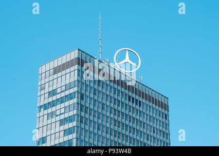 Berlin, Germany - july 2017: The top of the Europacenter building at Breitscheidplatz in Berlin with the logo of Mercedes Benz Stock Photo