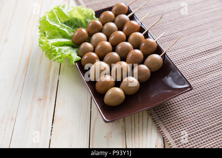 sate telur puyuh, bird egg traditional indonesian culinary skewer satay Stock Photo