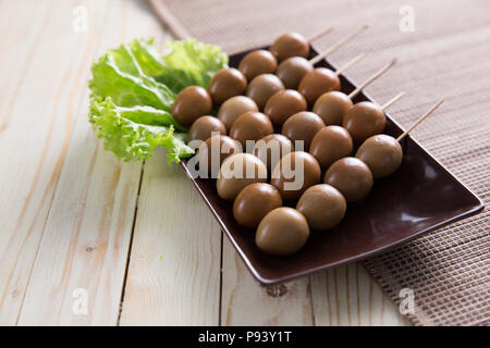 sate telur puyuh, bird egg traditional indonesian culinary skewer satay Stock Photo