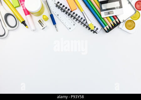 school stationary and tools for kids. pencils, paints, notebooks on white background, flat view Stock Photo