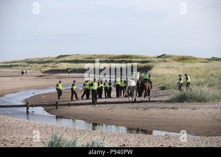 Police patrol the beach at the Trump Turnberry resort in South Ayrshire, where US President Donald Trump and first lady Melania Trump are spending the weekend. Stock Photo