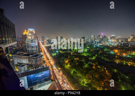 Night skyline of midtown Bangkok with Lumphini Park Stock Photo