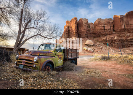 Deserted Dodge pickup vehicle parked near Twin Rocks trading post in Bluff, Utah