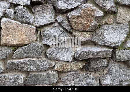 Rubble grey stone wall, rubblework. Stock Photo
