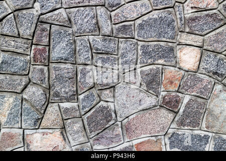 Rubble gray stone wall, rubblework. Stock Photo