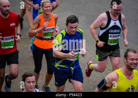 Alzheimers Society runners and fundraisers,  2017 Cardiff Half Marathon. Runners are showcasing the new look Alzheimer's Society outfit. Stock Photo