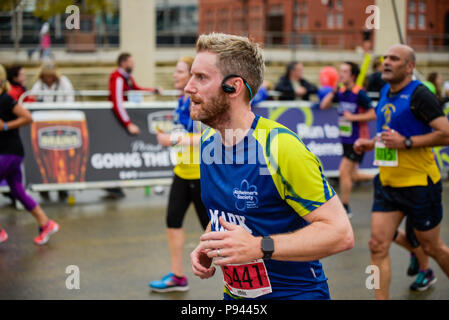 Alzheimers Society runners and fundraisers,  2017 Cardiff Half Marathon. Runners are showcasing the new look Alzheimer's Society outfit. Stock Photo