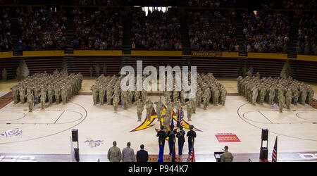 More than 400 Arizona Army National Guard Soldiers with 1st Battalion, 158th Infantry Regiment rally together with their families inside Wells Fargo Arena in Tempe, Arizona for an emotional farewell ceremony July 7, as the Battalion prepares for their deployment in support of Operation Spartan Shield (Photo by Army Spc. Nicholas Moyte, released). Stock Photo