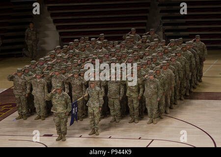 More than 400 Arizona Army National Guard Soldiers with 1st Battalion, 158th Infantry Regiment rally together with their families inside Wells Fargo Arena in Tempe, Arizona for an emotional farewell ceremony July 7, as the Battalion prepares for their deployment in support of Operation Spartan Shield (Photo by Army Spc. Nicholas Moyte, released). Stock Photo