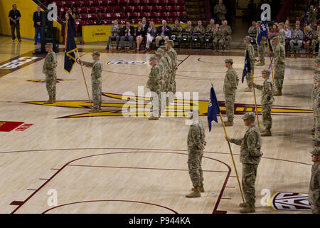 More than 400 Arizona Army National Guard Soldiers with 1st Battalion, 158th Infantry Regiment rally together with their families inside Wells Fargo Arena in Tempe, Arizona for an emotional farewell ceremony July 7, as the Battalion prepares for their deployment in support of Operation Spartan Shield (Photo by Army Spc. Nicholas Moyte, released). Stock Photo