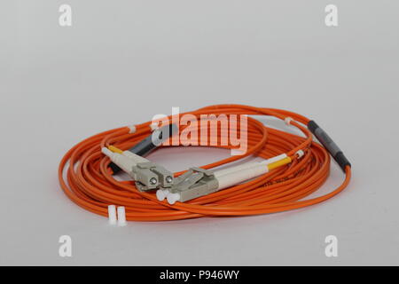 Fiber optics LC duplex connectors patch cord , isolated on white background Stock Photo